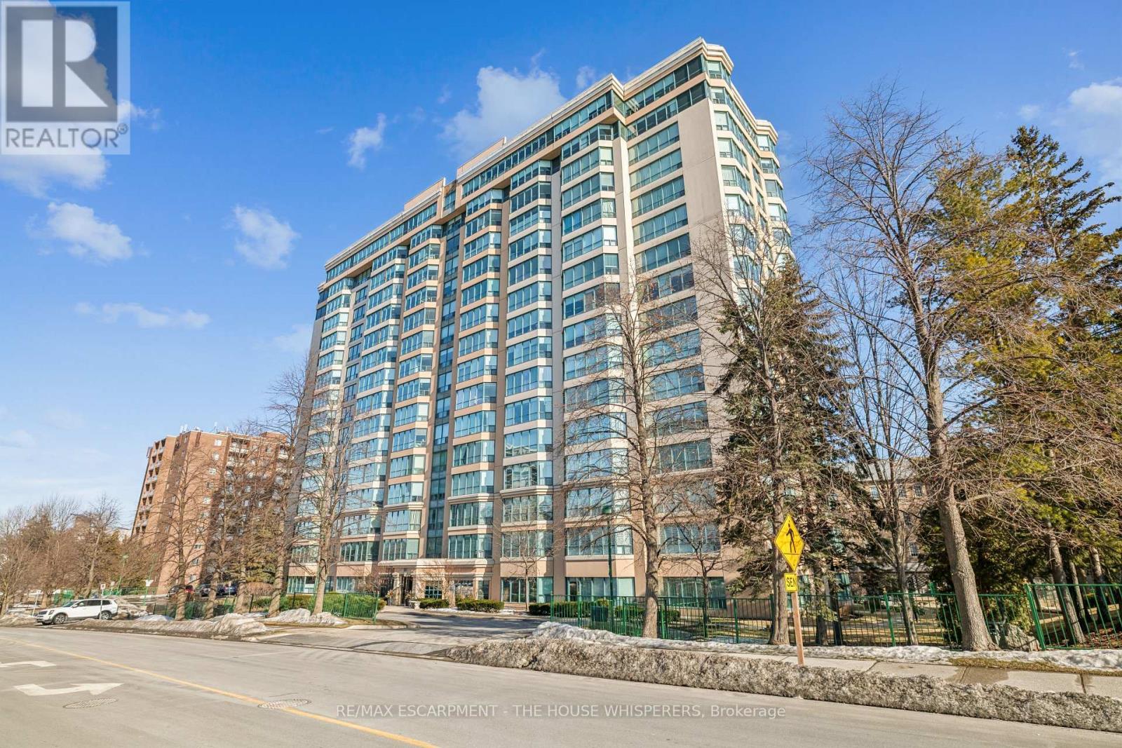 701 - 100 Millside Drive, Milton, Ontario  L9T 5E2 - Photo 2 - W12852436