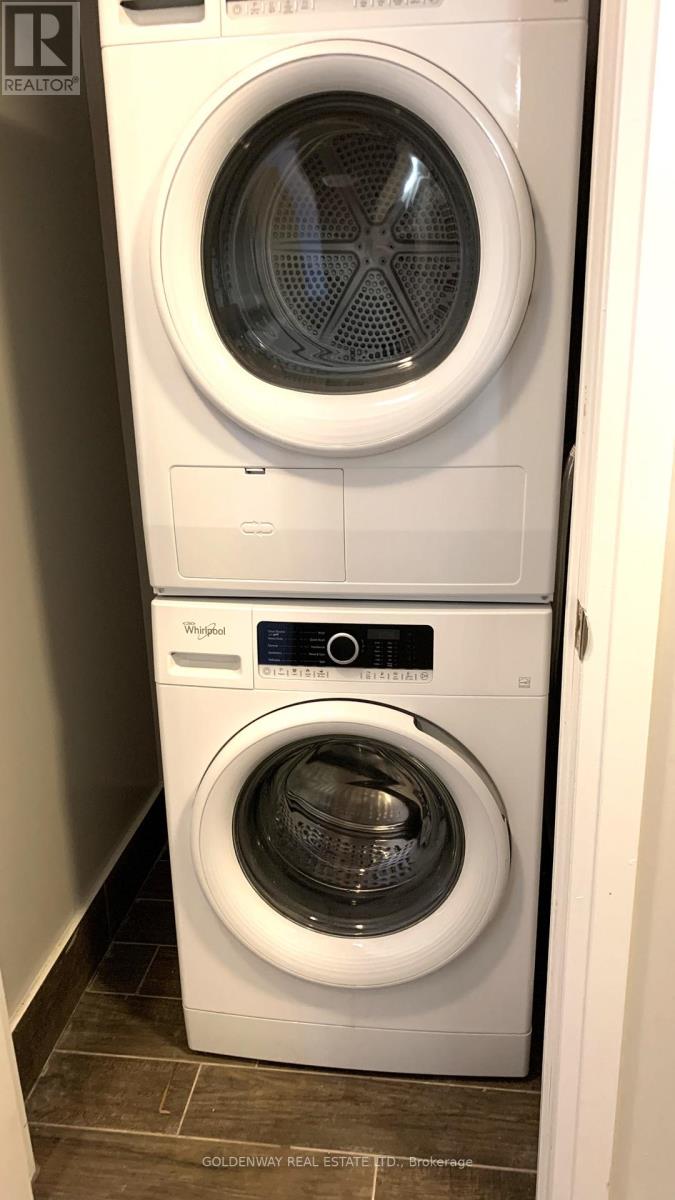 529 - 25 Water Walk Drive, Markham (Unionville), Ontario  L6G 0G3 - Photo 7 - N12852496