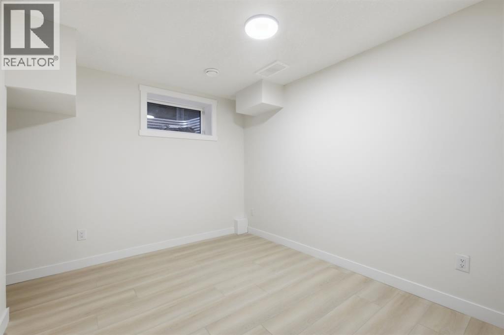 8426 Berkley Road Nw, Calgary, Alberta  T3K 1B4 - Photo 35 - A2283794