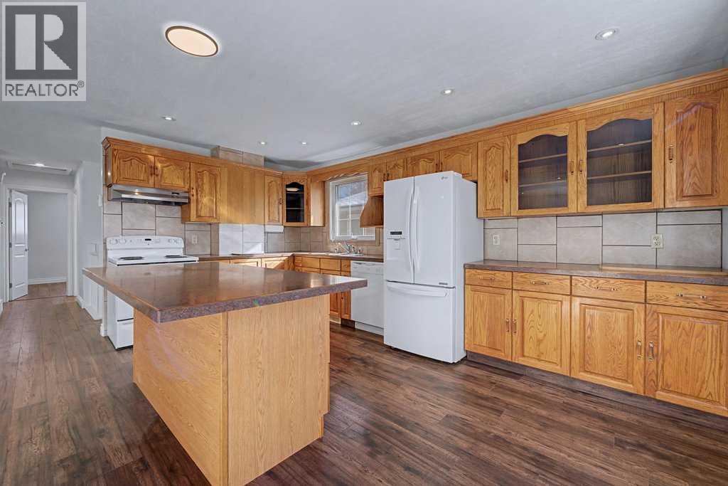 1607 Marlyn Way Ne, Calgary, Alberta  T2A 3K8 - Photo 21 - A2290581