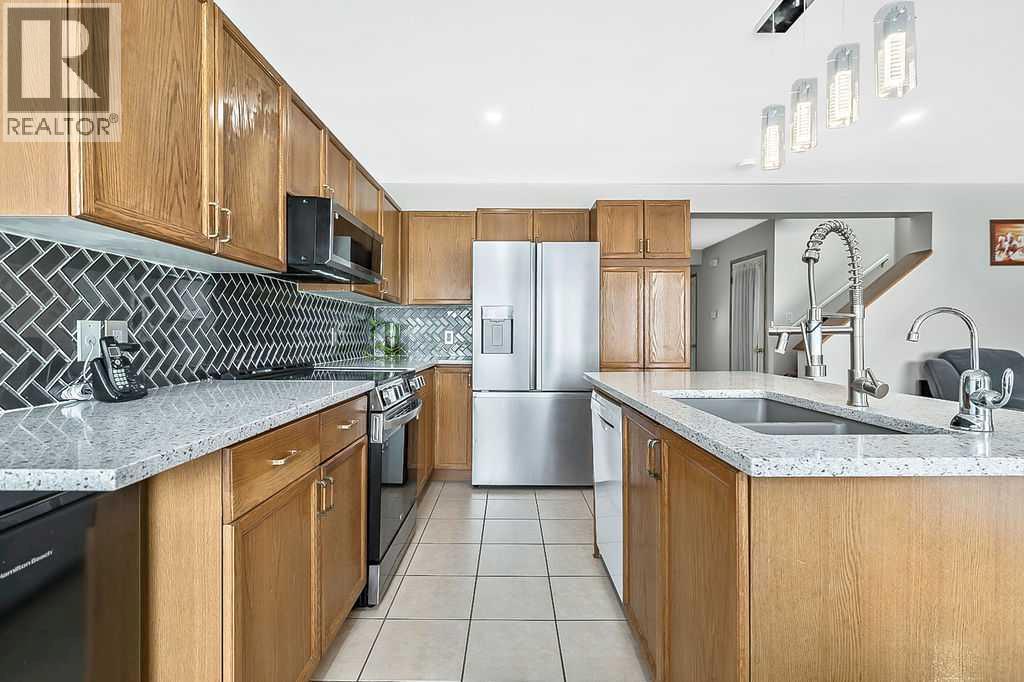 38 Martinwood Road Ne, Calgary, Alberta  T3J 3H5 - Photo 1 - A2290628