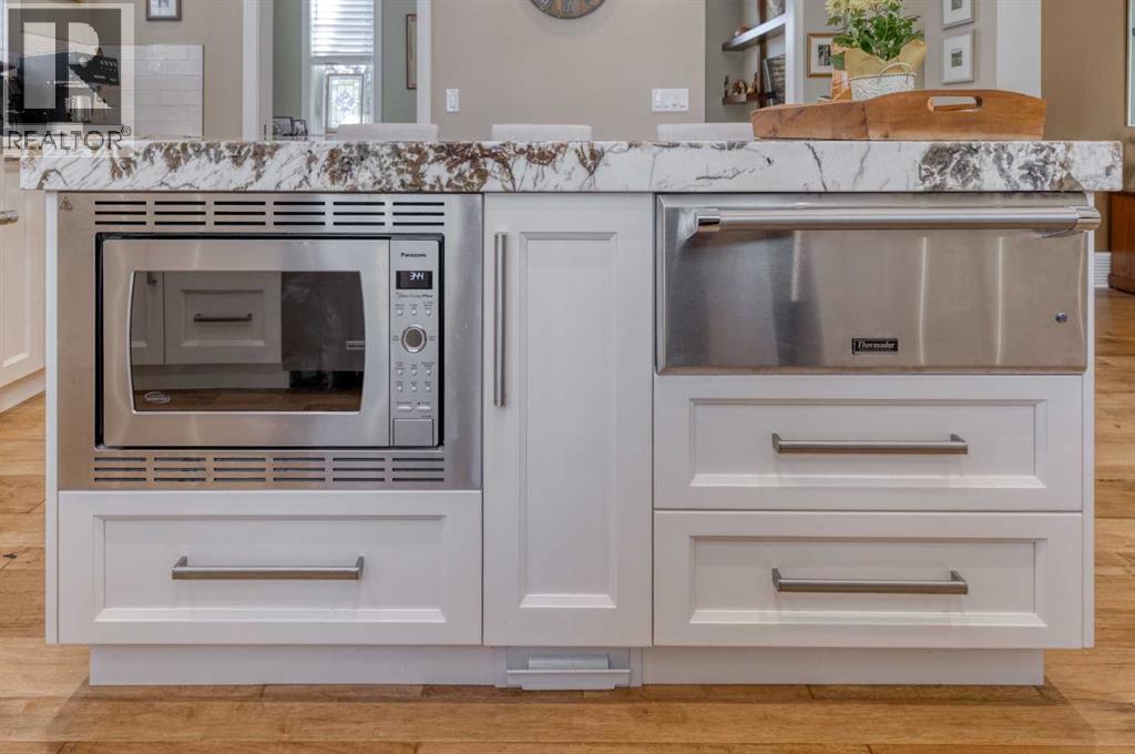 406 Hawk's Nest Grove, Priddis Greens, Alberta  T0L 1W3 - Photo 17 - A2289942