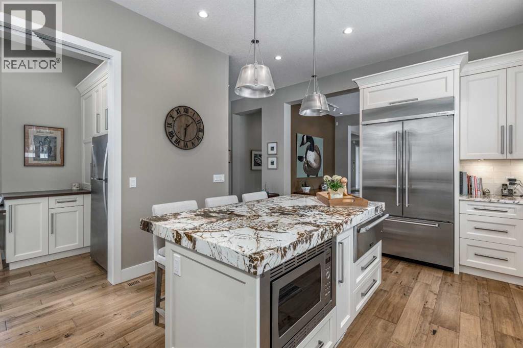 406 Hawk's Nest Grove, Priddis Greens, Alberta  T0L 1W3 - Photo 18 - A2289942