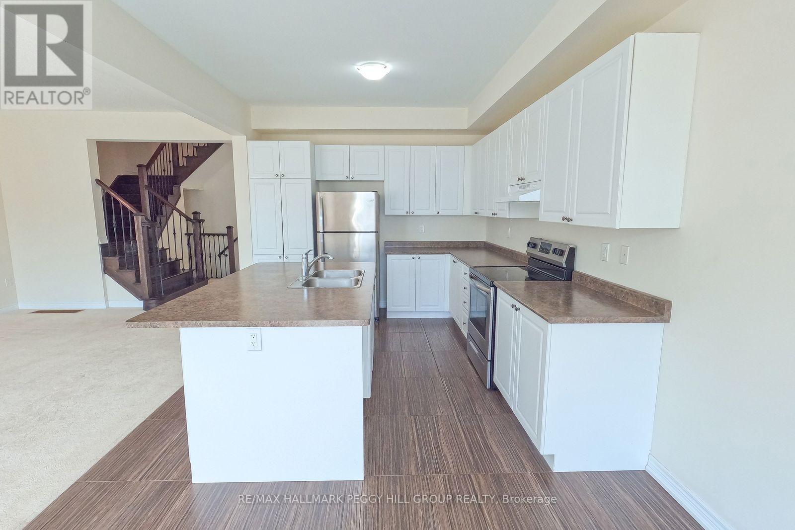 50 Sasco Way, Essa (Angus), Ontario  L0M 1B4 - Photo 5 - N12853404