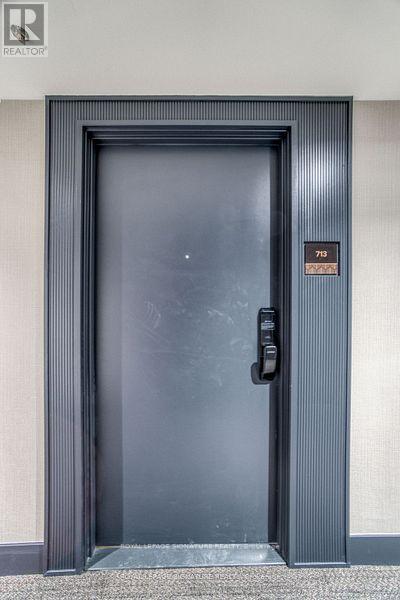 713 - 405 Dundas Street W, Oakville, Ontario  L6M 4P9 - Photo 4 - W12853528