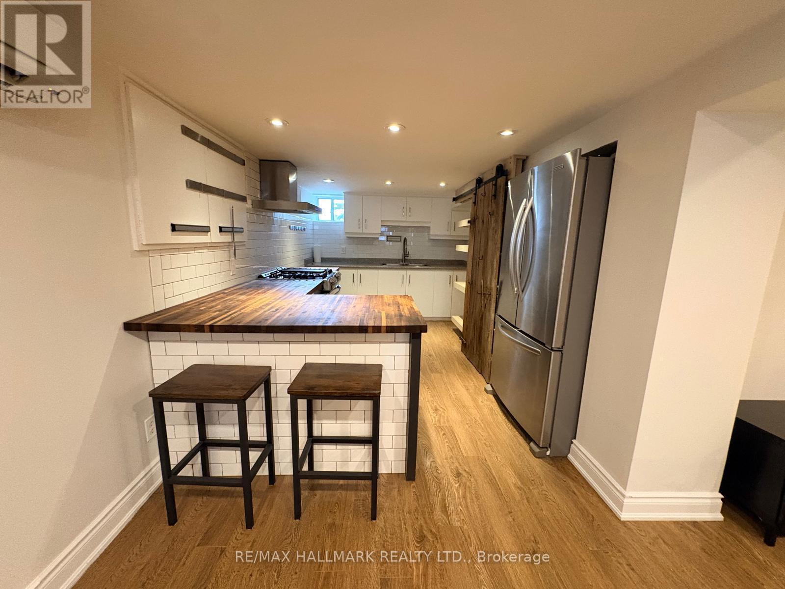 A - 1381 Queen Street E, Toronto (Greenwood-Coxwell), Ontario  M4L 1C7 - Photo 5 - E12853818