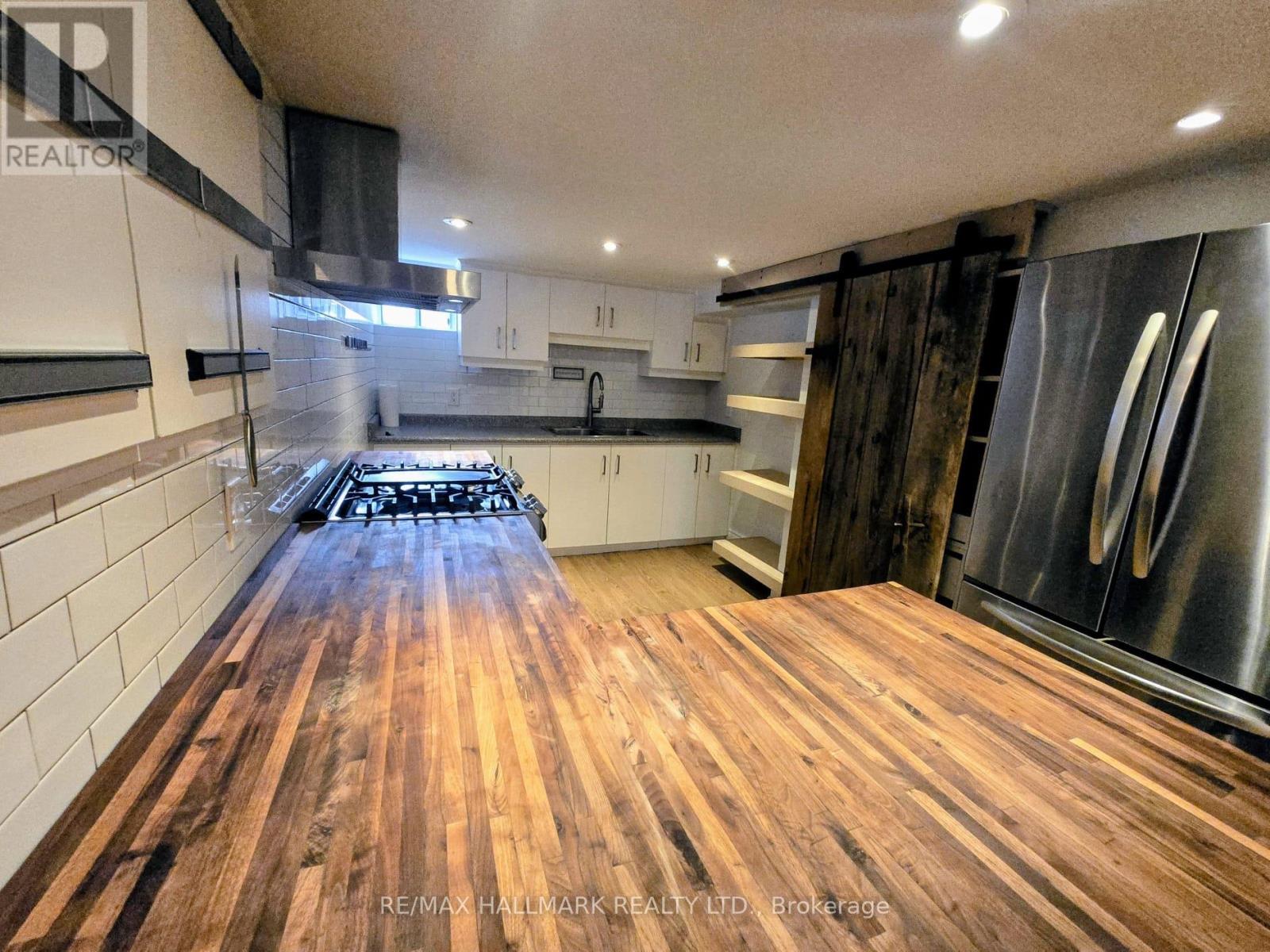 A - 1381 Queen Street E, Toronto (Greenwood-Coxwell), Ontario  M4L 1C7 - Photo 7 - E12853818