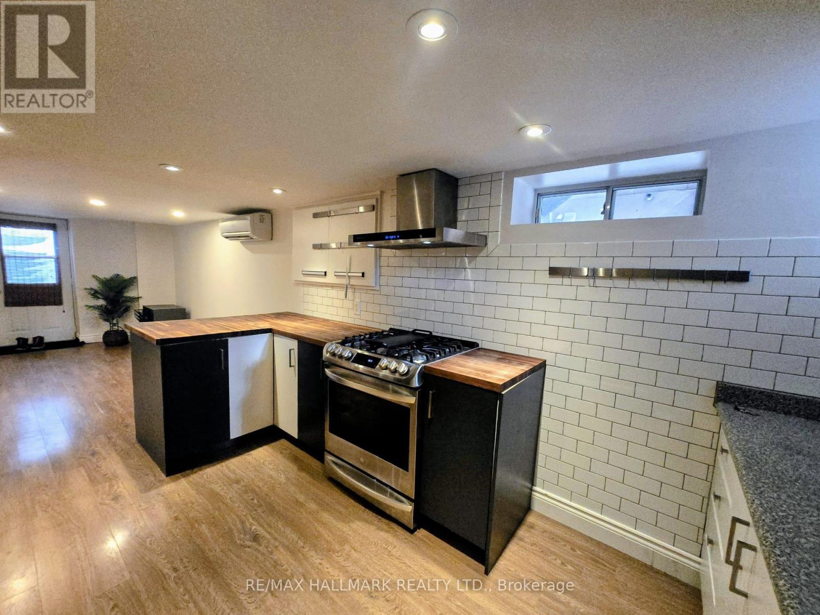 A - 1381 Queen Street E, Toronto (Greenwood-Coxwell), Ontario  M4L 1C7 - Photo 9 - E12853818