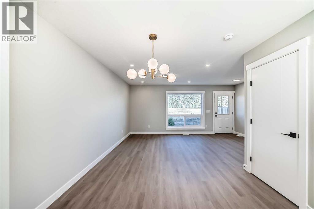 703 Clover Road, Carstairs, Alberta  T0M 0N0 - Photo 11 - A2278310