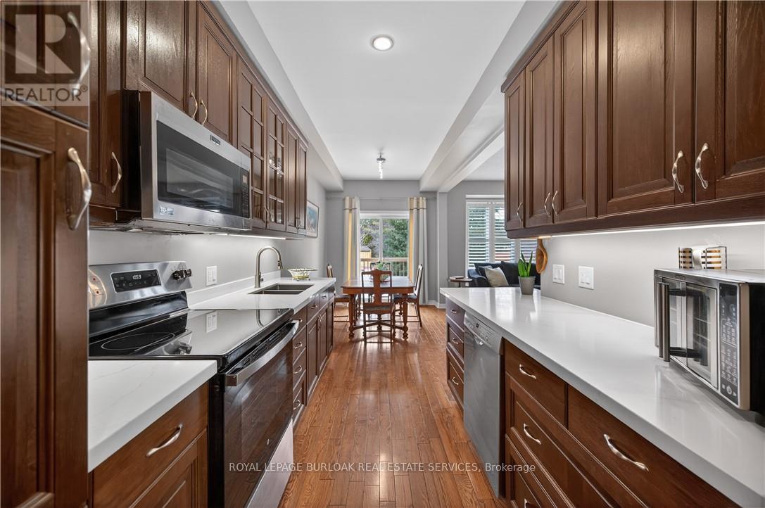 41 - 300 Ravineview Way, Oakville (Wc Wedgewood Creek), Ontario  L6H 7J2 - Photo 23 - W12722416