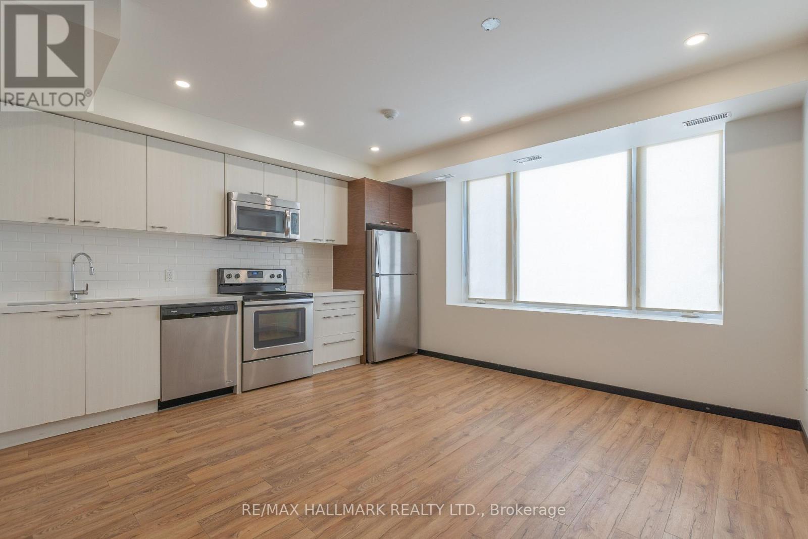1b - 2277 Queen Street E, Toronto, Ontario  M4E 1G5 - Photo 3 - E12854634