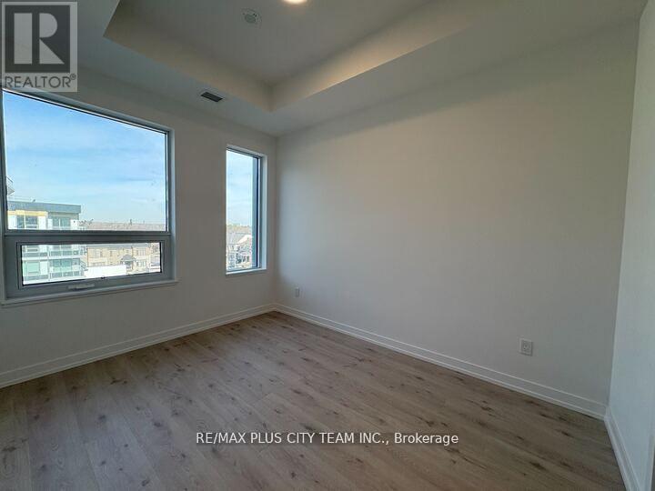 456 - 2501 Saw Whet Boulevard, Oakville, Ontario  L6M 5N2 - Photo 5 - W12854362