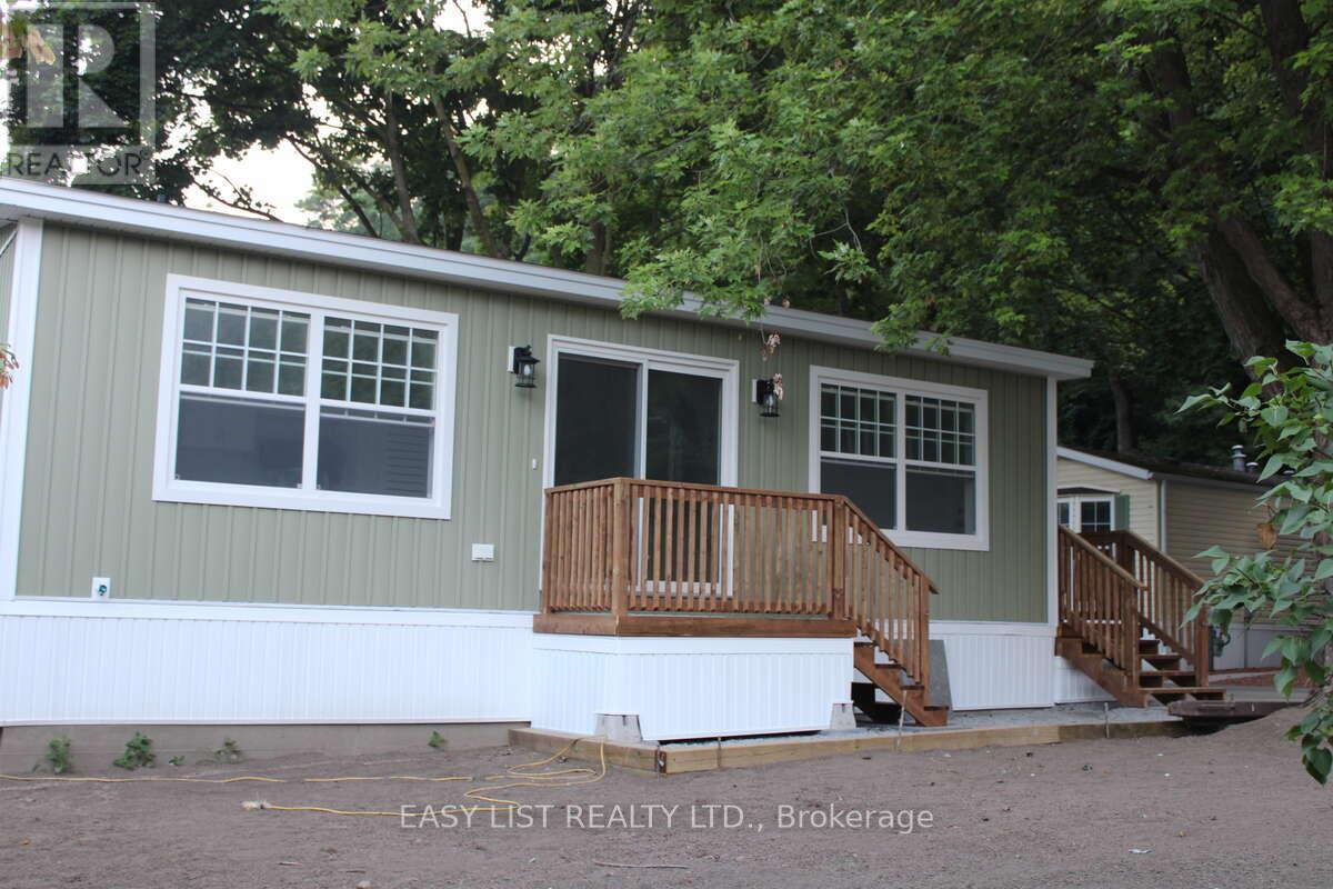 472 - 23 Four Mile Creek Road, Niagara-On-The-Lake, Ontario  L0S 1J1 - Photo 2 - X12854544