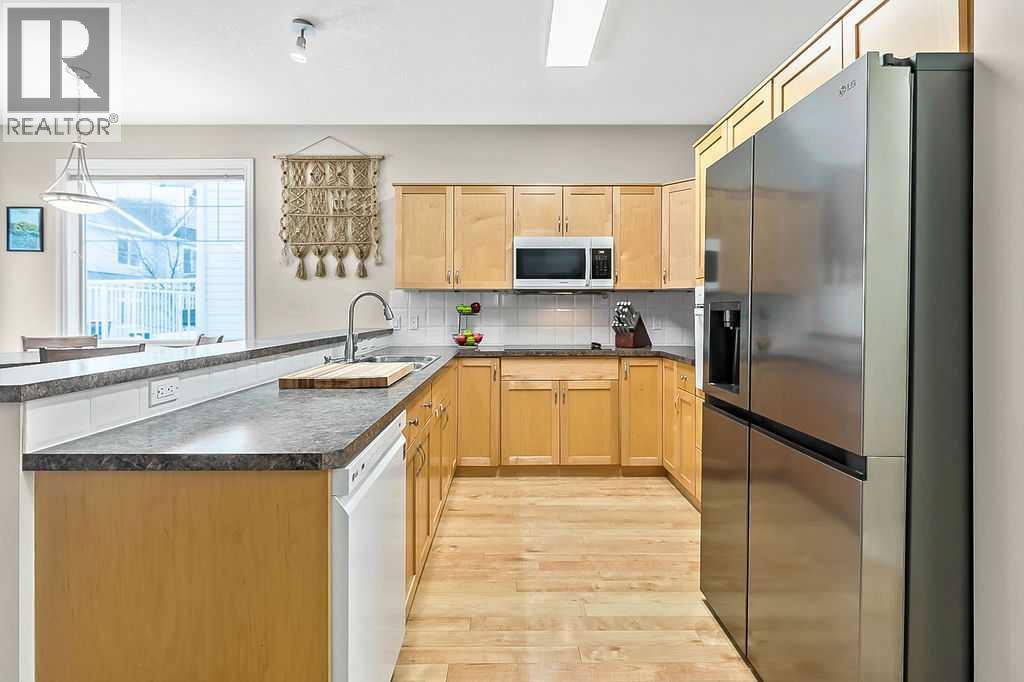 48 Tucker Circle, Okotoks, Alberta  T1S 2J7 - Photo 7 - A2287383