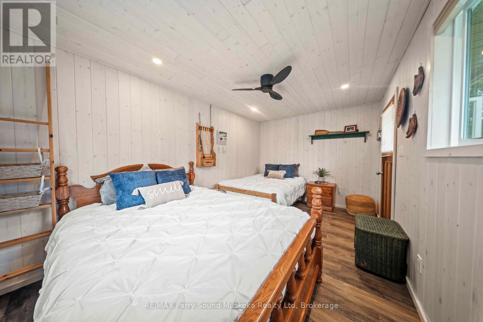 16 Golden Horseshoe Lane, Whitestone, Ontario  P0G 1G0 - Photo 38 - X12854918