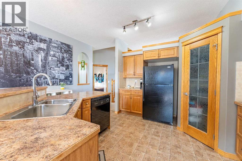 2051 Sagewood Rise Sw, Airdrie, Alberta  T4B 3N7 - Photo 4 - A2289803