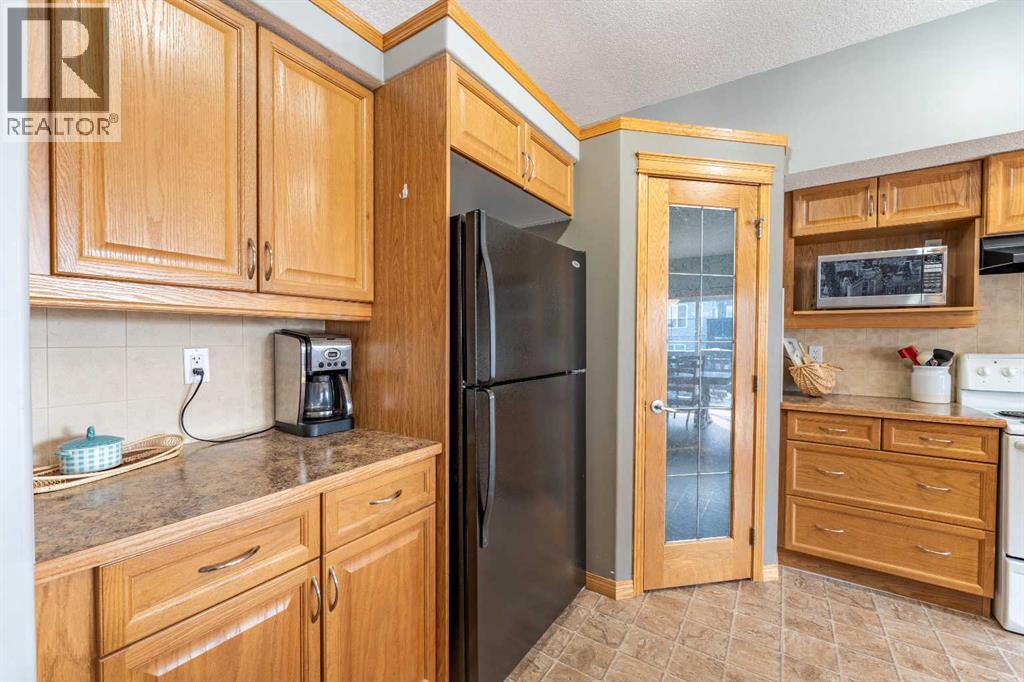 2051 Sagewood Rise Sw, Airdrie, Alberta  T4B 3N7 - Photo 6 - A2289803