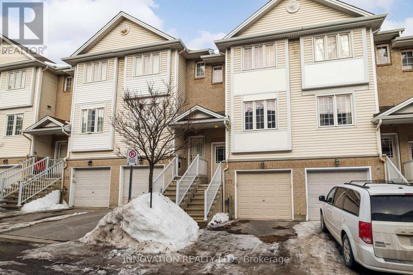 Bright and beautifully positioned, this spacious 3-storey townhome offers nearly 1,400 sq. ft. of versatile living space in a central Ottawa location-backing directly onto a walking and bike path with no rear neighbours and a stunning tree-lined backdrop.The second level showcases a functional eat-in kitchen with stainless steel appliances, a double sink, ample cabinetry, and a cheerful breakfast area overlooking the private backyard. The open-concept living and dining room is filled with natural light and features elegant hardwood flooring-ideal for both everyday living and entertaining. A convenient powder room completes this level.Upstairs, you'll find two generously sized bedrooms with excellent closet space. One bedroom features a wall-to-wall closet and a cheater door to the full bathroom, providing convenient semi-ensuite access, while the other offers both a walk-in and secondary closet. Both rooms are bright, comfortable, and well proportioned.The lower level adds exceptional flexibility with a bright rec room or flex space-perfect as a home office, guest area, or additional bedroom. Sliding patio doors lead to a private fenced yard with a patio ideal for barbecues and gatherings. This level also includes laundry, interior garage access, and additional storage. And for even more space, a full basement below grade offers excellent storage. Parking for two (garage and driveway) and an unbeatable location near the Civic Hospital, steps to the Central Experimental Farm, bike and walking paths, transit, parks, restaurants, and schools complete the package. Where everyday comfort meets an exceptional backdrop-an opportunity worth acting on. (id:48254)