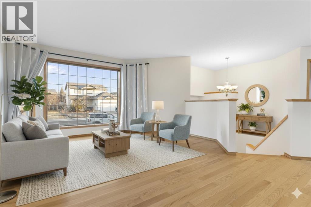 165 Quigley Drive, Cochrane, Alberta  T4C 1R4 - Photo 4 - A2290069