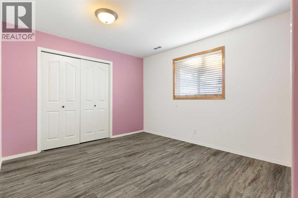 165 Quigley Drive, Cochrane, Alberta  T4C 1R4 - Photo 34 - A2290069