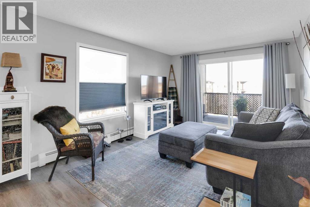 8401, 304 Mackenzie Way Sw, Airdrie, Alberta  T4B 3H8 - Photo 2 - A2282493