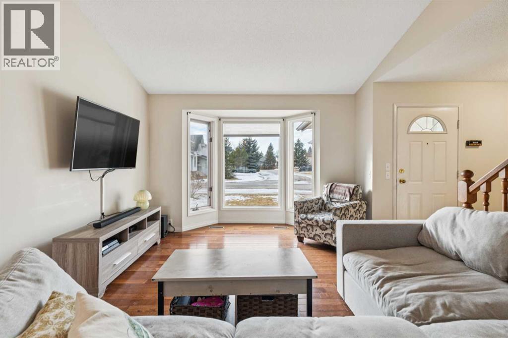 124 Woodmark Crescent Sw, Calgary, Alberta  T2W 4Z2 - Photo 7 - A2281355