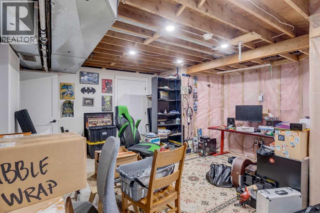 124 Woodmark Crescent Sw, Calgary, Alberta  T2W 4Z2 - Photo 31 - A2281355