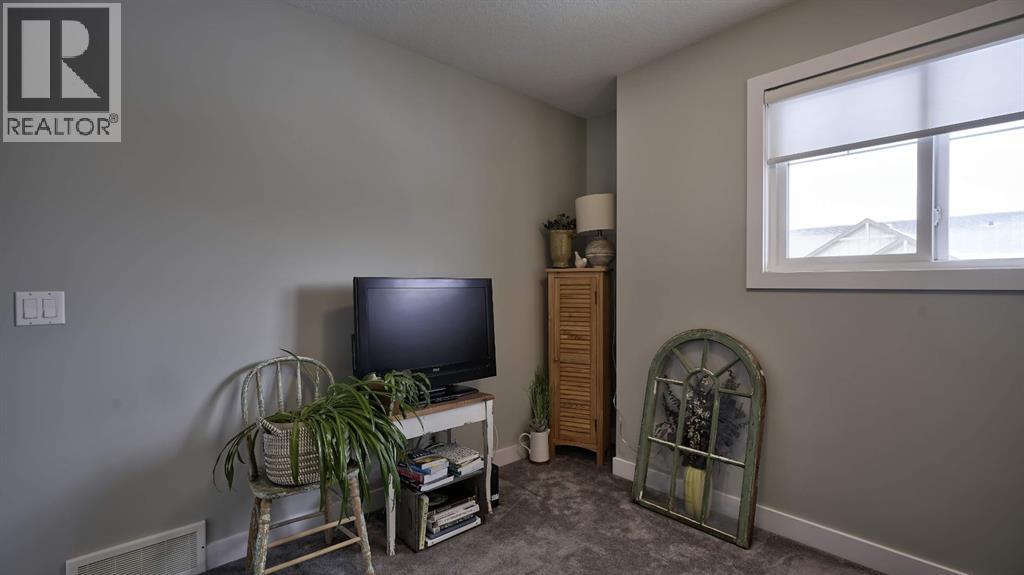 135 Reunion Loop Nw, Airdrie, Alberta  T4B 4J6 - Photo 35 - A2291091