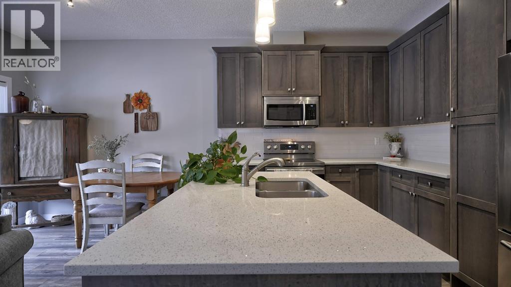 135 Reunion Loop Nw, Airdrie, Alberta  T4B 4J6 - Photo 8 - A2291091