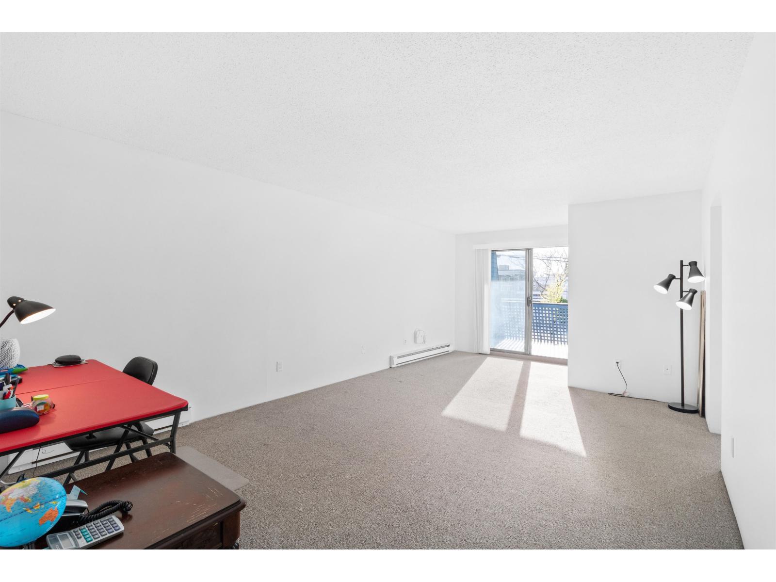 103 17661 58a Avenue, Surrey, British Columbia  V3S 1N4 - Photo 3 - R3097052