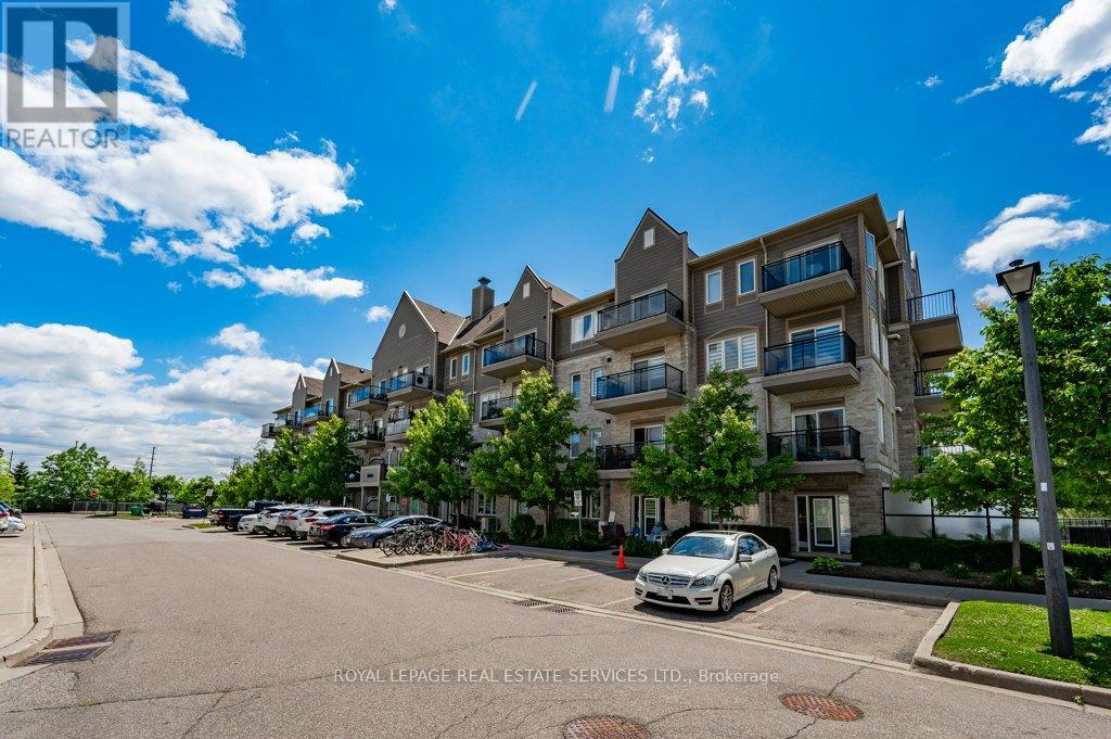 101 - 3055 Thomas Street, Mississauga (Churchill Meadows), Ontario  L5M 0M4 - Photo 2 - W12855892