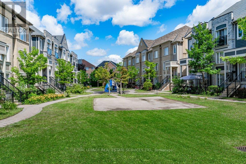 101 - 3055 Thomas Street, Mississauga (Churchill Meadows), Ontario  L5M 0M4 - Photo 3 - W12855892