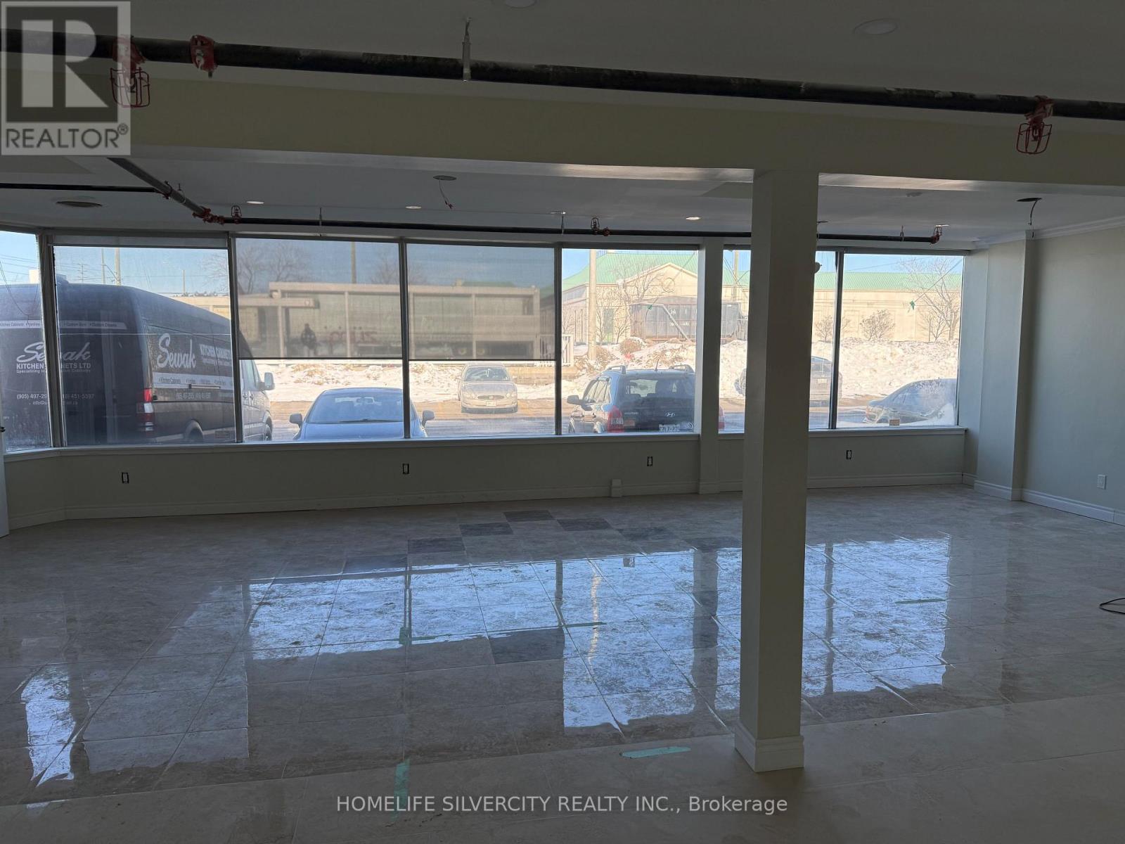 Unit # 17 - 2565 Steeles Avenue E, Brampton, Ontario  L6T 4L6 - Photo 2 - W12856396