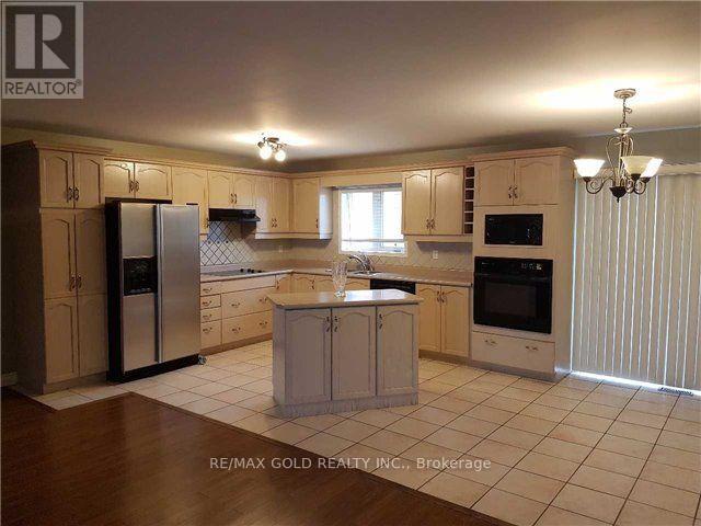 1 Spalding Gate W, Brampton, Ontario  L6Y 4S8 - Photo 4 - W12687914