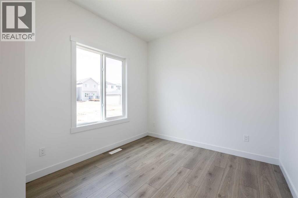 134 Heartland Street, Cochrane, Alberta  T4C 3L9 - Photo 20 - A2291378