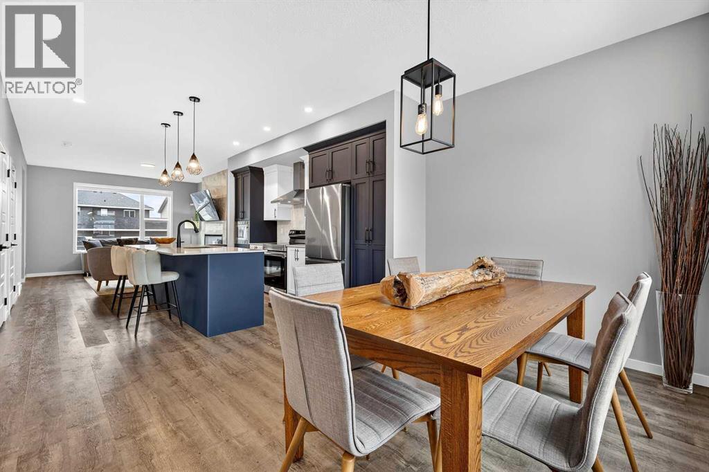 94 Wolf Gate Nw, Okotoks, Alberta  T1S 5T9 - Photo 3 - A2290958