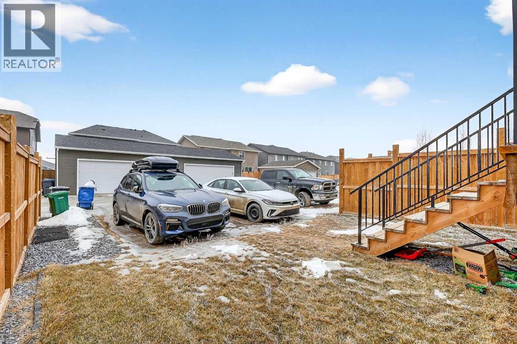 94 Wolf Gate Nw, Okotoks, Alberta  T1S 5T9 - Photo 31 - A2290958