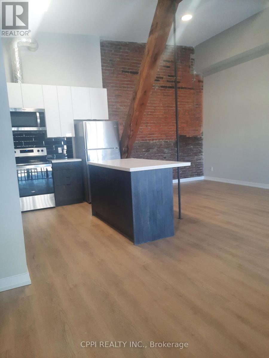 203 - 140 Simcoe Street, Peterborough, Ontario  K9H 0K5 - Photo 2 - X12856816