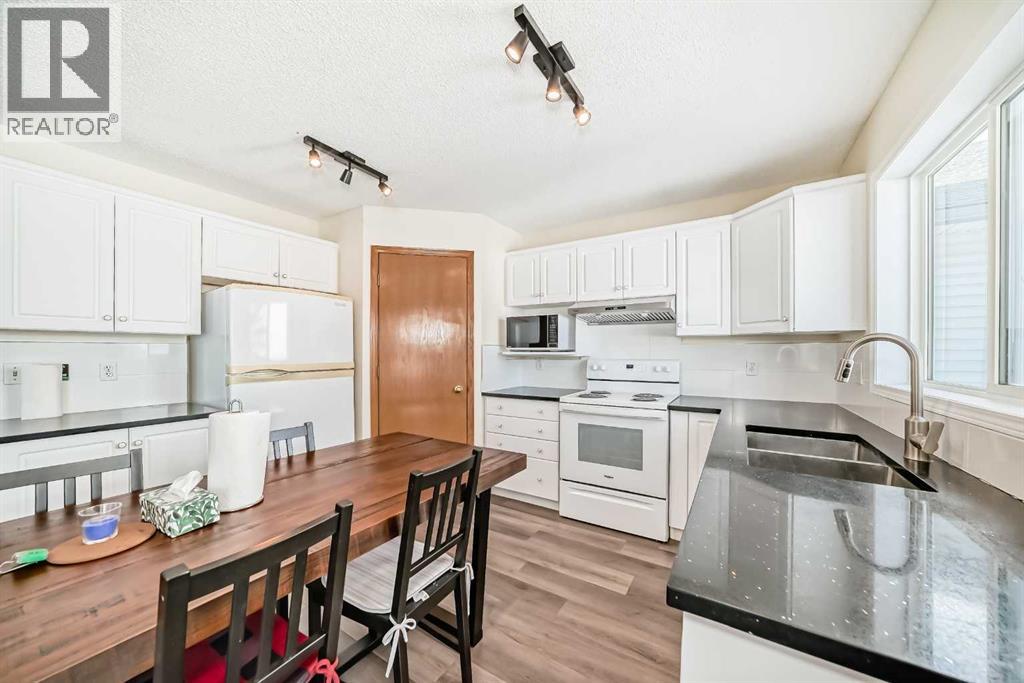 136 Citadel Crest Circle Nw, Calgary, Alberta  T3G 4G3 - Photo 5 - A2290174