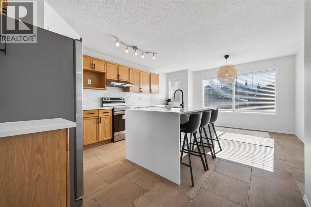 641 Evermeadow Road Sw, Calgary, Alberta  T2Y 4W8 - Photo 9 - A2289748