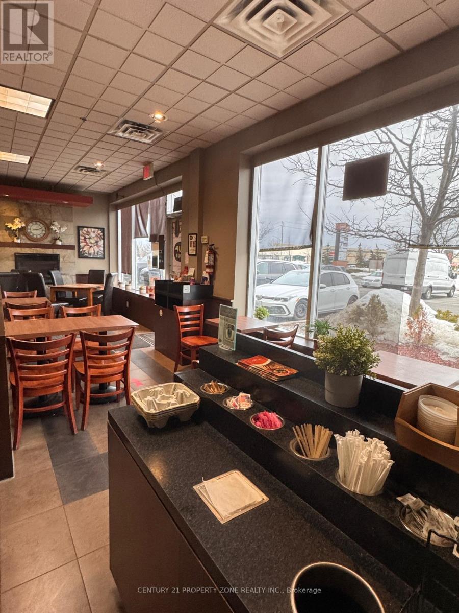 101 - 170 Mcewan Drive, Caledon, Ontario  L7E 4C8 - Photo 2 - W12857214