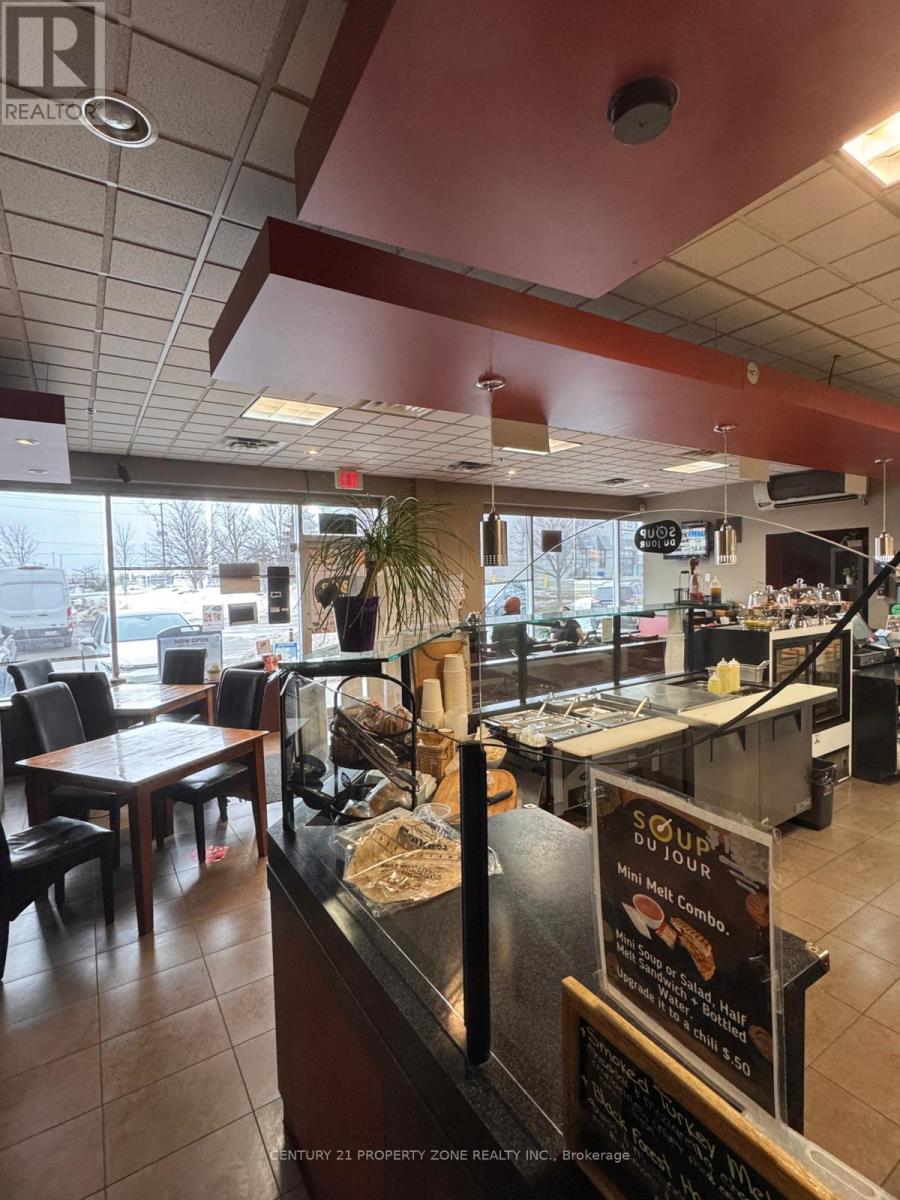 101 - 170 Mcewan Drive, Caledon, Ontario  L7E 4C8 - Photo 4 - W12857214