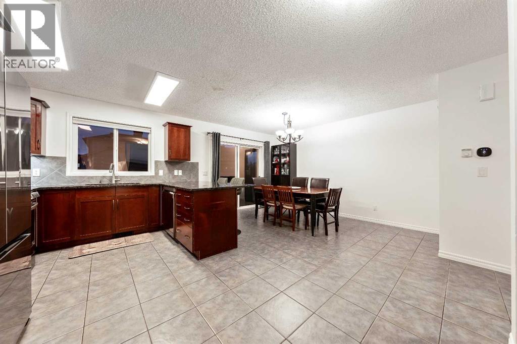 21 Mckinnon Street Nw, Langdon, Alberta  T0J 1X2 - Photo 11 - A2274079