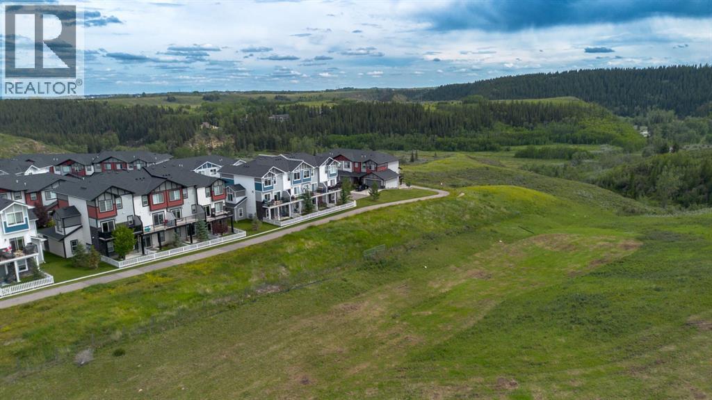 1703 Jumping Pound Common, Cochrane, Alberta  T4C 2L1 - Photo 5 - A2276569