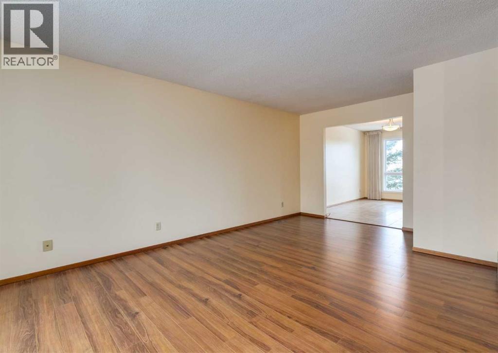 60 Macewan Glen Drive Nw, Calgary, Alberta  T3K 2C5 - Photo 3 - A2288560