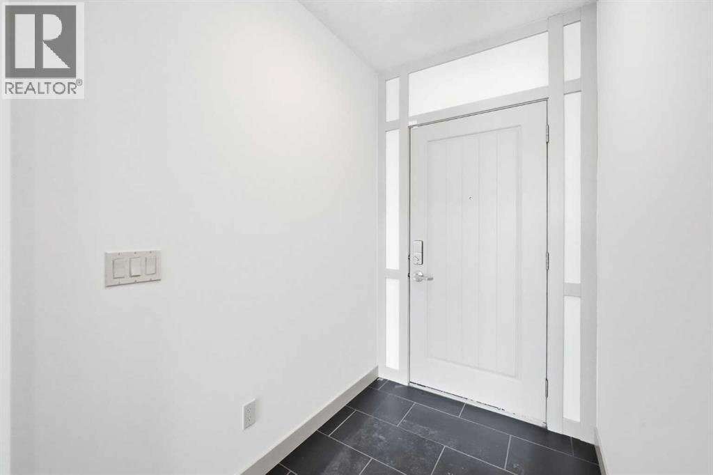 428 Aspen Glen Place Sw, Calgary, Alberta  T3H 0E9 - Photo 4 - A2288704