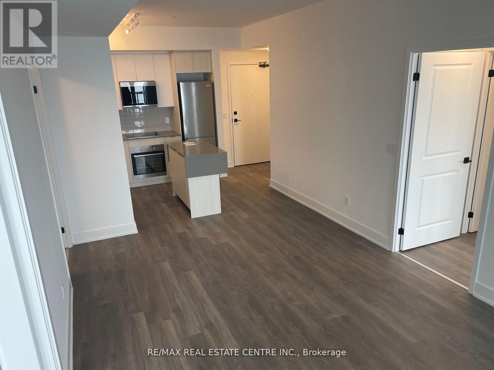 1320 - 2489 Taunton Road, Oakville, Ontario  L6H 3R9 - Photo 2 - W12857402