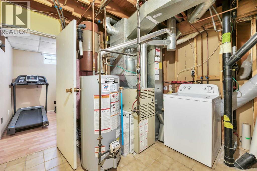 56 Woodglen Court Sw, Calgary, Alberta  T2W 4K3 - Photo 35 - A2286720