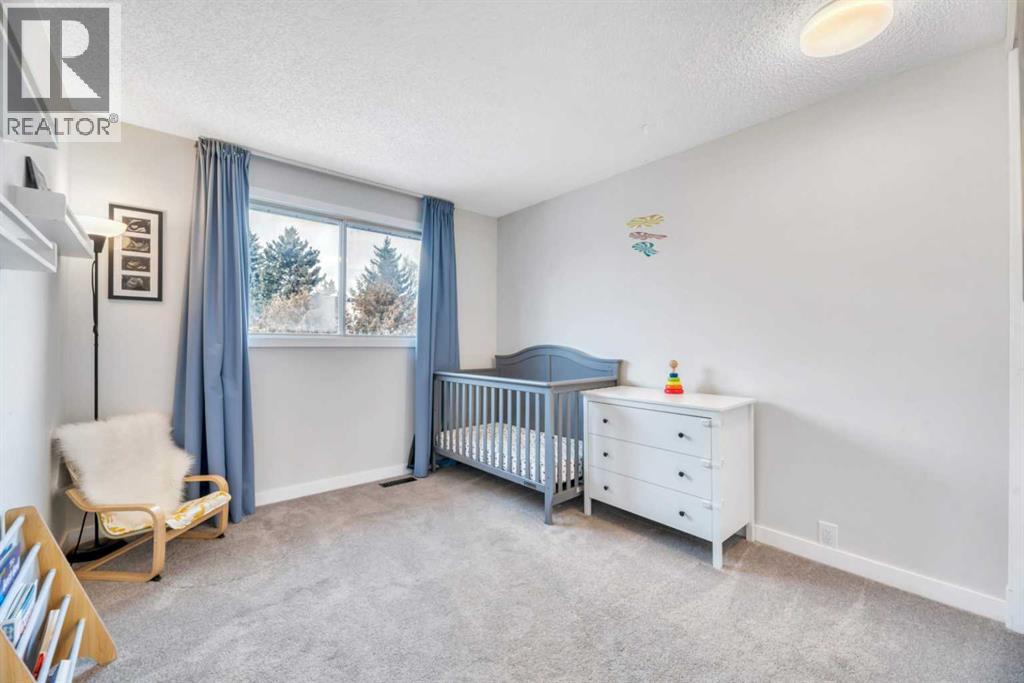 56 Woodglen Court Sw, Calgary, Alberta  T2W 4K3 - Photo 25 - A2286720