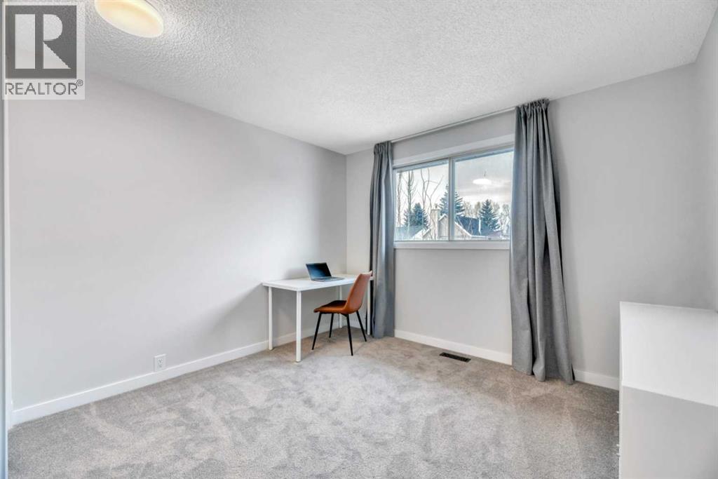 56 Woodglen Court Sw, Calgary, Alberta  T2W 4K3 - Photo 27 - A2286720
